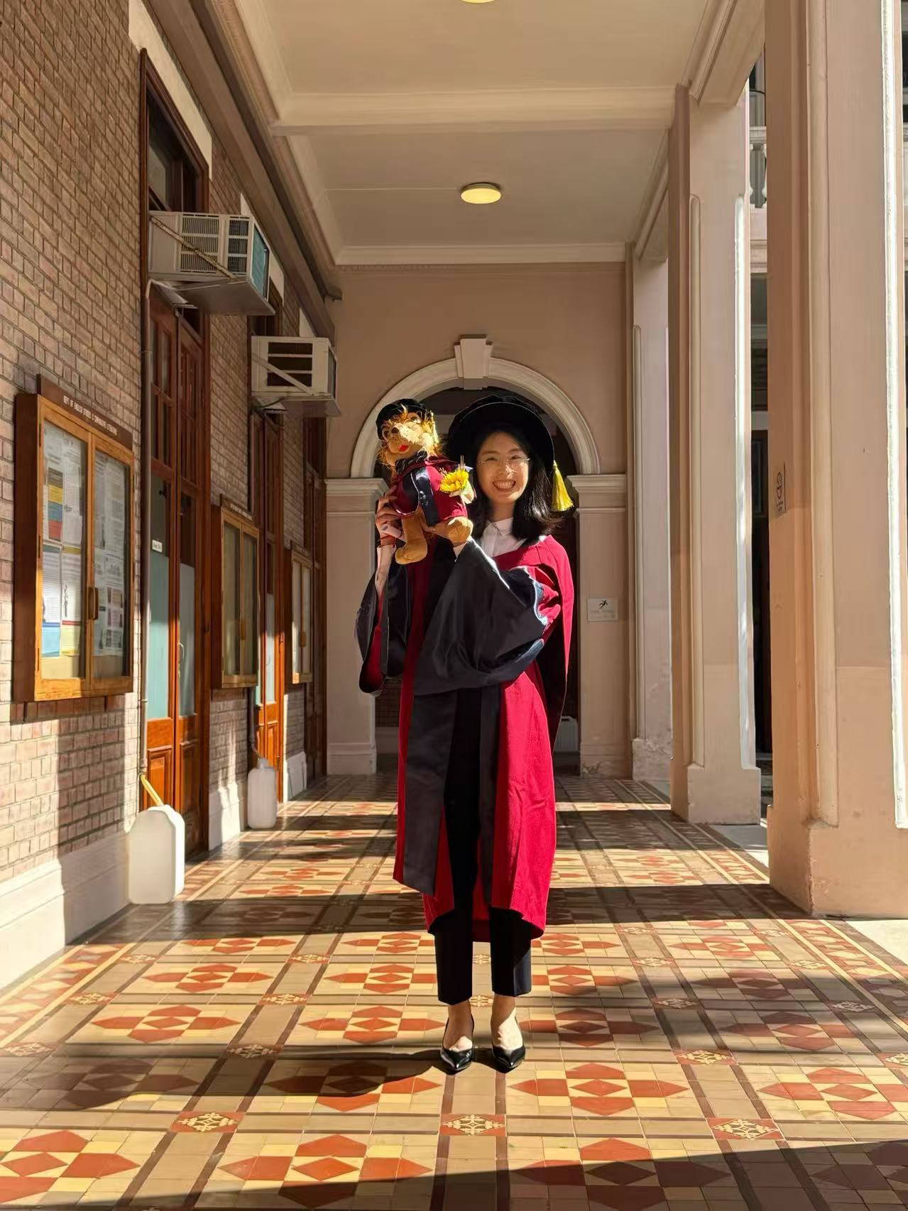 Ling Yang celebrating her Ph.D. graduation at The University of Hong Kong